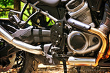 Close up photo of a front view of a Pan America Master Cylinder Reservoir Reloacting Kit on a Motorcycle